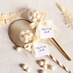 Podziękowania dla gości na Chrzest Święty - Grzechotka z kremowymi drażetkami o smaku kokosowym